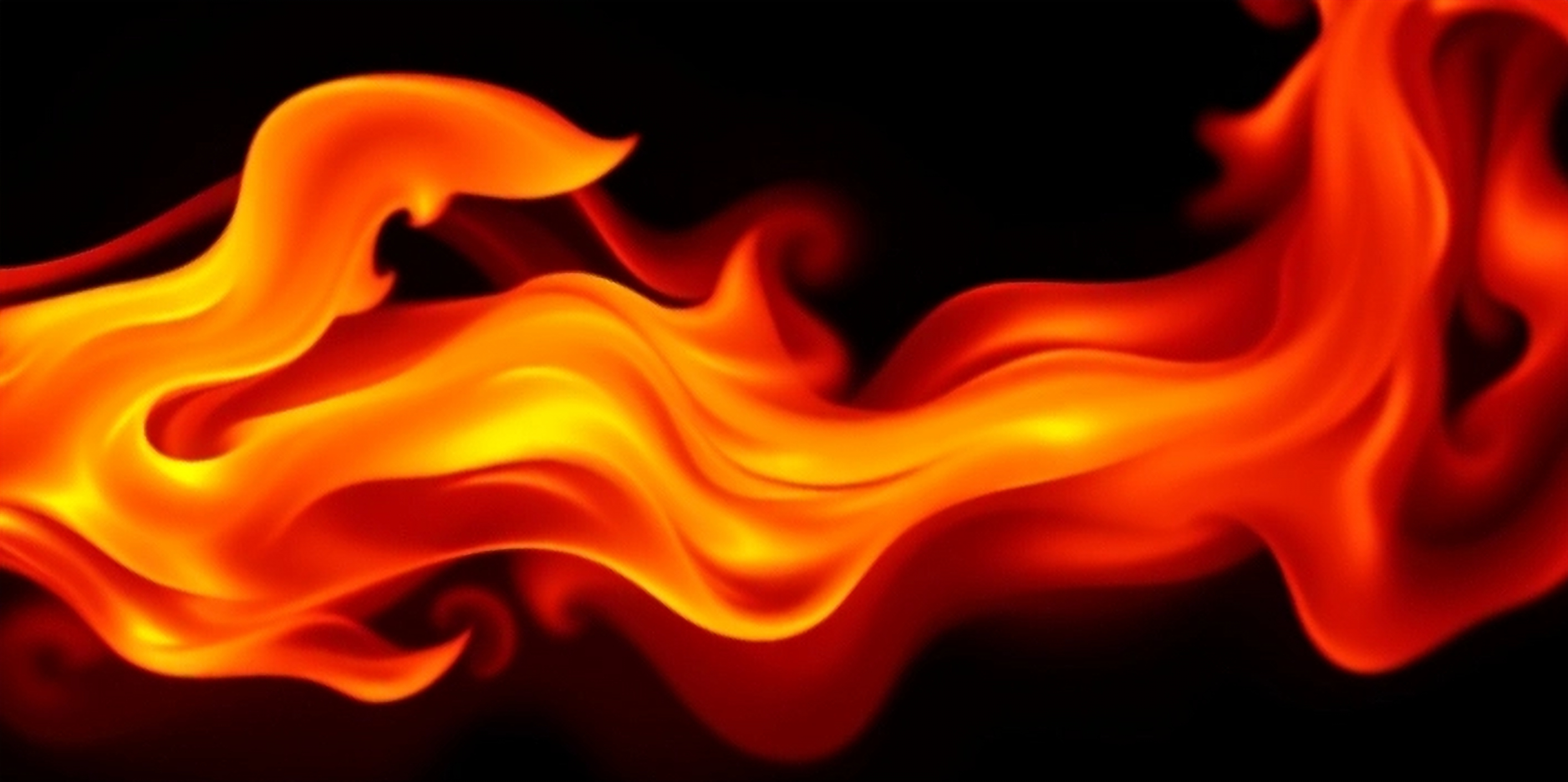 Abstract orange and red fire trails on black